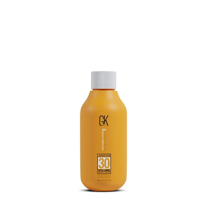 GK Hair Juvexin 30 Volume Developer, squat 150 ml amber bottle with a white screw cap, shown on a white background