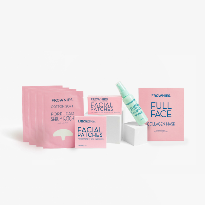 Frownies skincare products including facial patches, serum patches, a calming toner, and collagen mask on a white background