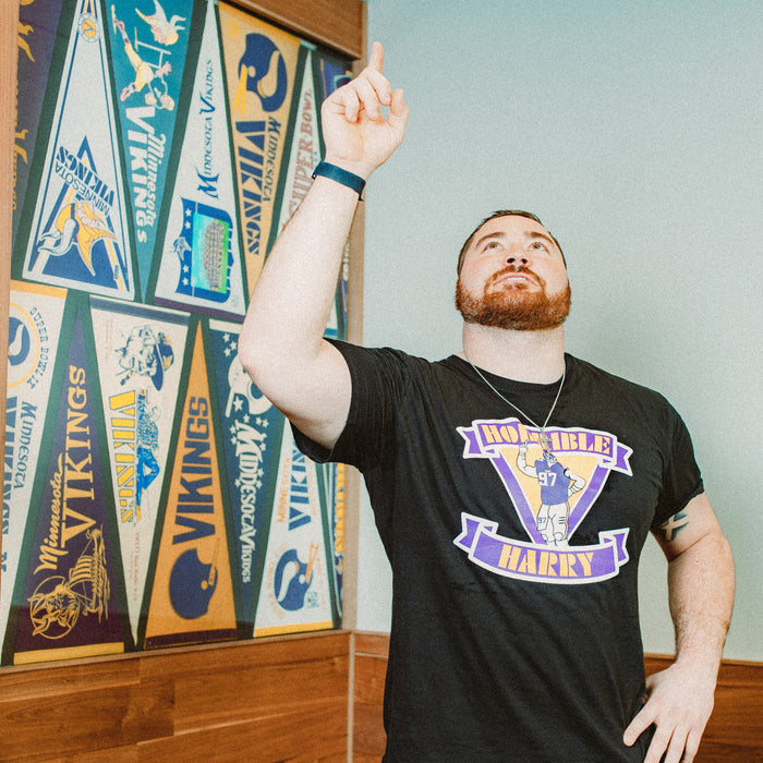 Harrison Phillips wearing black horrible harry t-shirt