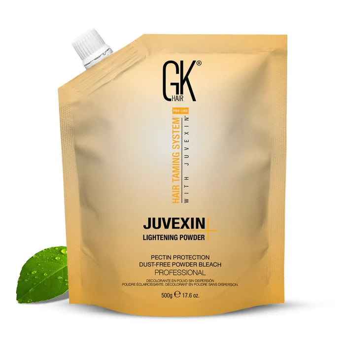 GK Hair Juvexin Lightening Powder+ 500 g gold pouch, pectin protection dust-free powder bleach, a dewy green leaf beside it