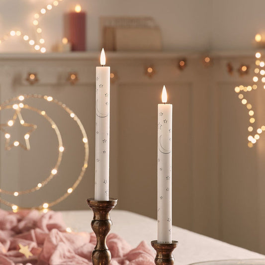 CA24005-Set-of-2-TruGlow-Taper-Candles-with-Moon-_-Star-Design.jpg