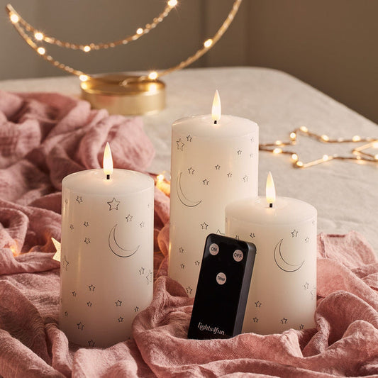 CA24003-Set-of-3-Truglow-Pillar-Candles-with-Moon-_-Star-Design.jpg