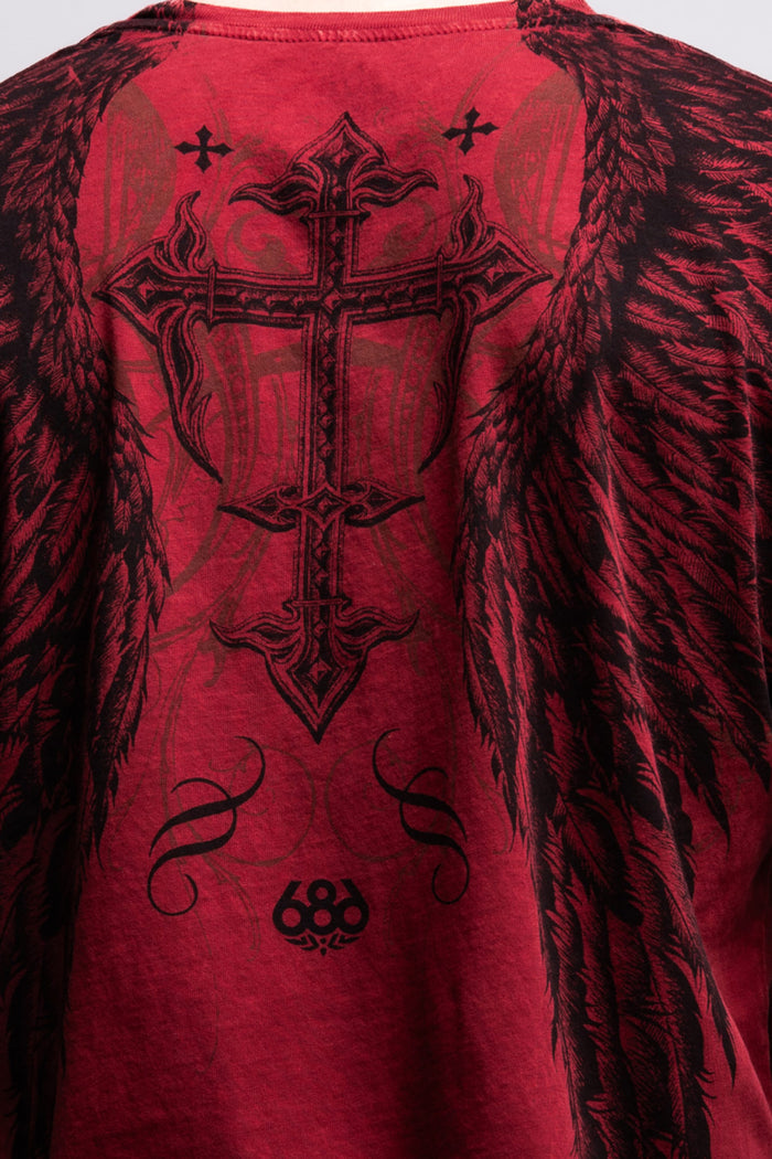 The 686 Affliction Death Eyes SS Tee by 686 is a bold red men‚Äôs t-shirt with a large black ornate cross, angel wings, swirling details, and the number 68 near the bottom. Made from 100% cotton for comfort and style.