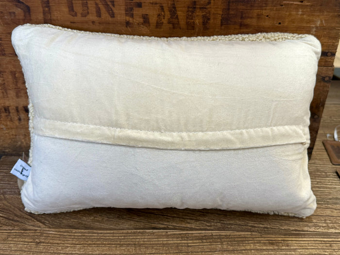 Hand-hooked wool pillow back, solid cream with stitched seam and fabric tag