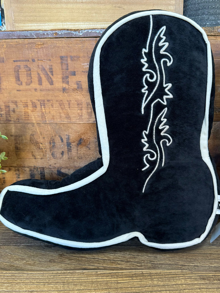 Black cowboy boot-shaped pillow, side view, white piping and stitched decorative stripe