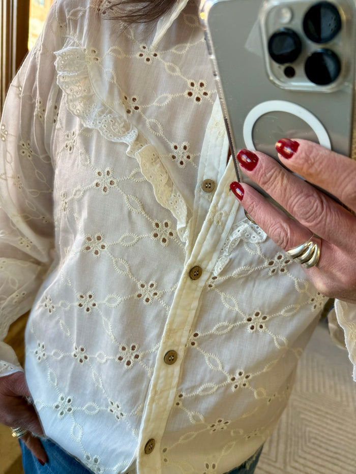 Ivory eyelet long-sleeve shirt with button placket and scalloped ruffle