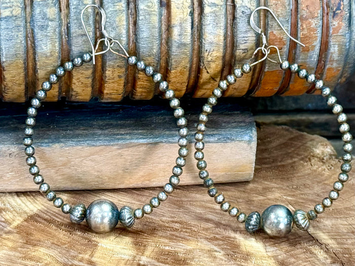 Sterling silver beaded hoop earrings with front round ball bead detail