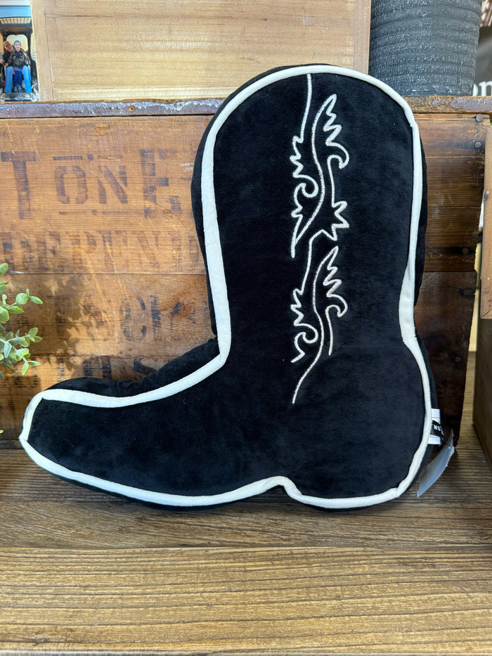 Black cowboy boot-shaped pillow with white outline and white stitched scroll design