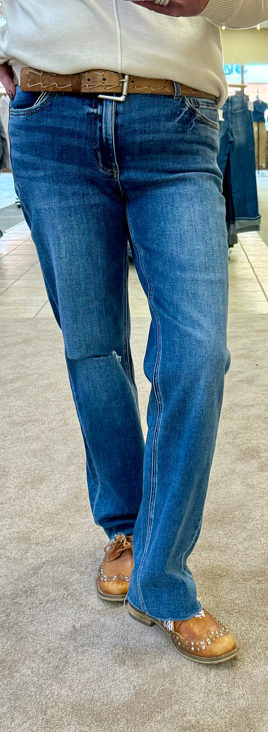 Women's straight jeans, dark blue wash with raw hem and belt loops