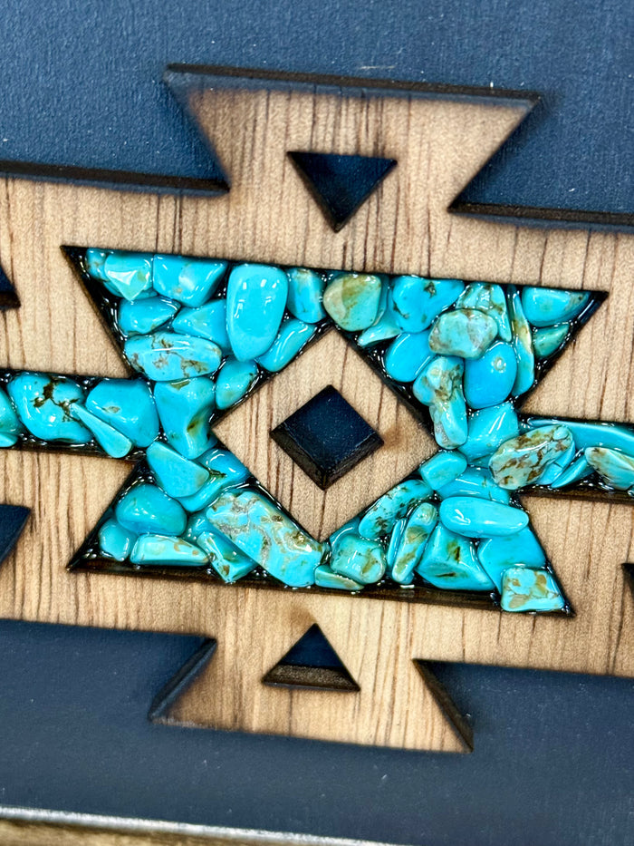 Turquoise gemstone mosaic inlaid on Aztec wood wall art with dark geometric borders