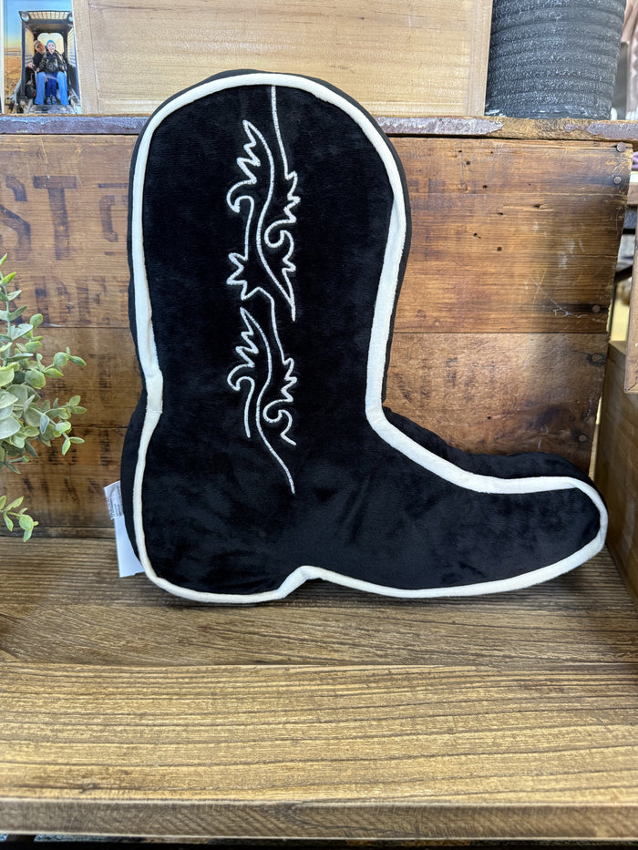 Black cowboy boot-shaped pillow with white outline and vertical scroll embroidery, whole