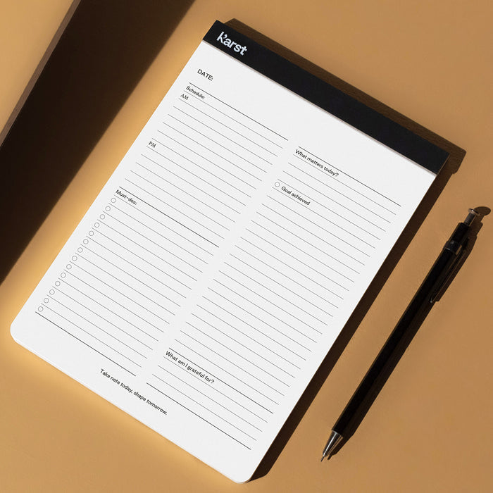 Karst Stone Paper Daily Action Pad A5 planner page with structured daily schedule and to-do list layout, eco-friendly stone paper notepad for productivity, planning, task management, and goal tracking.
