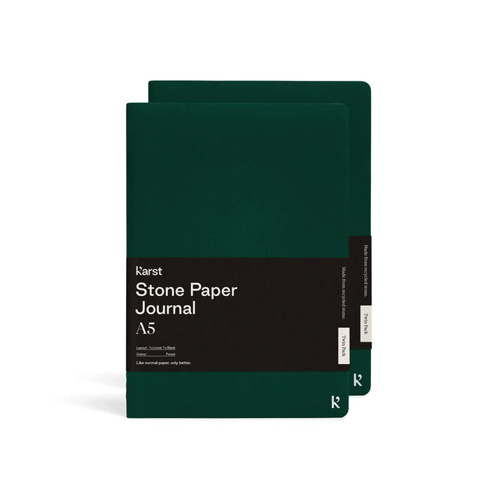 Karst A5 Stone Paper Journal twin pack in forest green with soft covers and black branded belly band, displayed on a light gray background.