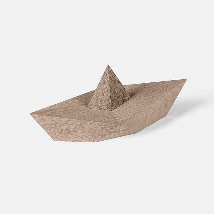 Wooden boat model on a white background