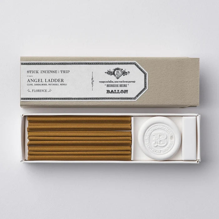 A box of incense sticks with the lid open, showing the brand name 'Ballon' and the product name 'Incense Angel Ladder'. The sticks are placed in a compartment alongside a wax holder.