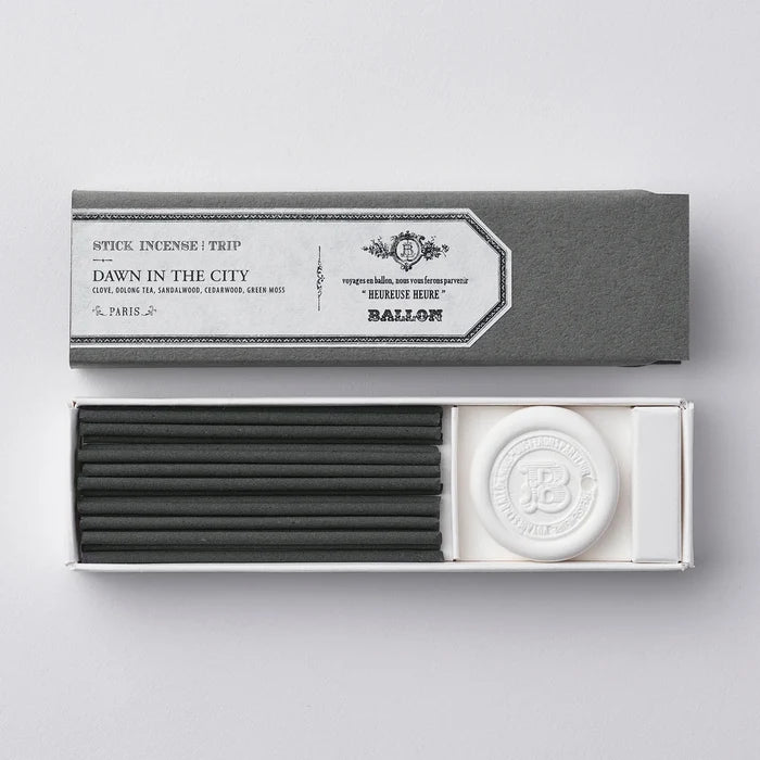 A box of incense sticks with the lid open, showing the brand name 'Ballon' and the product name 'Incense Angel Ladder'. The sticks are placed in a compartment alongside a wax holder.