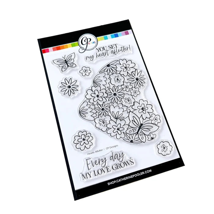 Catherine Pooler - Stamp & Die Set - Hearts Aflutter. Set someone's heart aflutter with this beautiful stamp set and coordinating dies! The Hearts Aflutter Stamps features a large, line-art heart made of flowers and a butterfly. Available at Embellish Away located in Bowmanville Ontario Canada