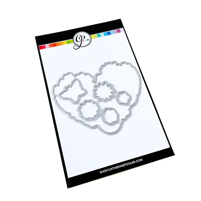 Catherine Pooler - Stamp & Die Set - Hearts Aflutter. Set someone's heart aflutter with this beautiful stamp set and coordinating dies! The Hearts Aflutter Stamps features a large, line-art heart made of flowers and a butterfly. Available at Embellish Away located in Bowmanville Ontario Canada