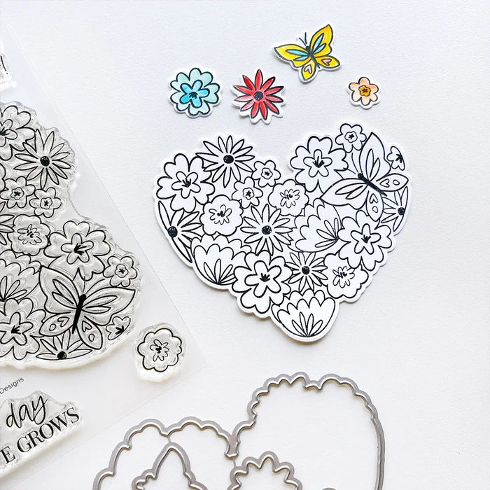 Catherine Pooler - Stamp & Die Set - Hearts Aflutter. Set someone's heart aflutter with this beautiful stamp set and coordinating dies! The Hearts Aflutter Stamps features a large, line-art heart made of flowers and a butterfly. Available at Embellish Away located in Bowmanville Ontario Canada Example by brand ambassador.