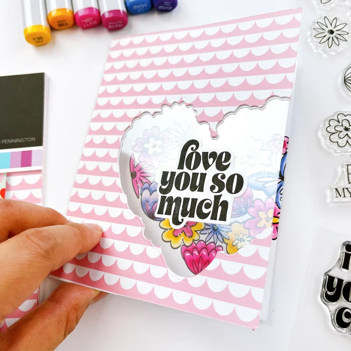 Catherine Pooler - Stamp & Die Set - Hearts Aflutter. Set someone's heart aflutter with this beautiful stamp set and coordinating dies! The Hearts Aflutter Stamps features a large, line-art heart made of flowers and a butterfly. Available at Embellish Away located in Bowmanville Ontario Canada Example by brand ambassador.