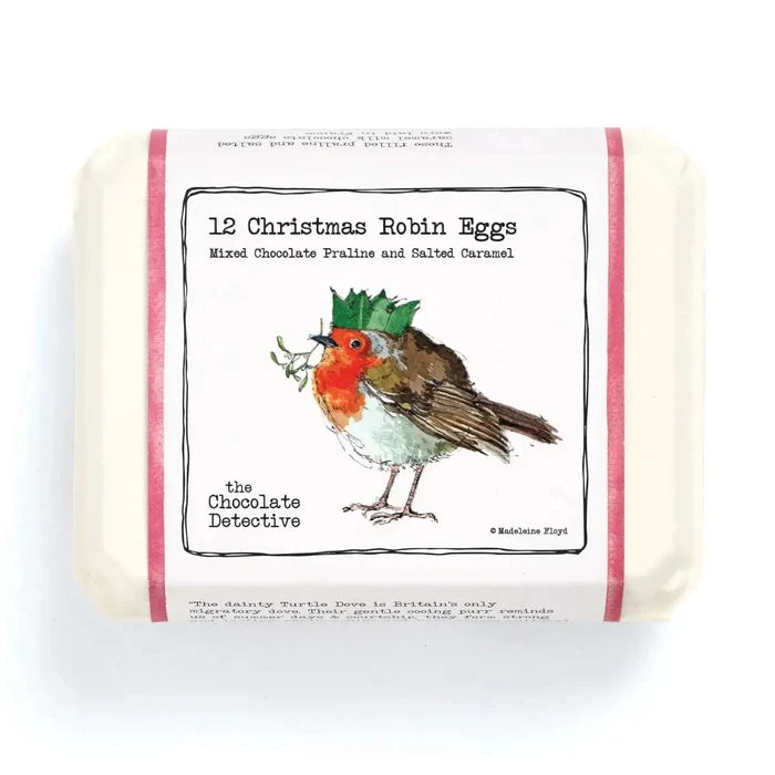 Bar of soap with a Christmas robin design and text on a white background