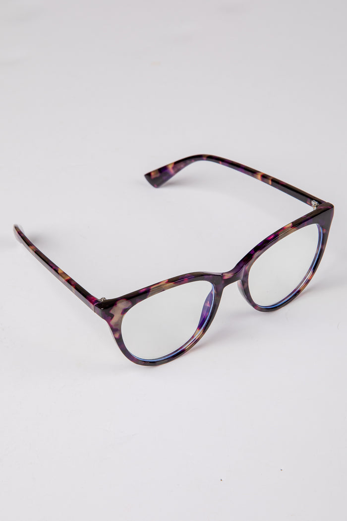 Tortoiseshell eyeglasses on a white background