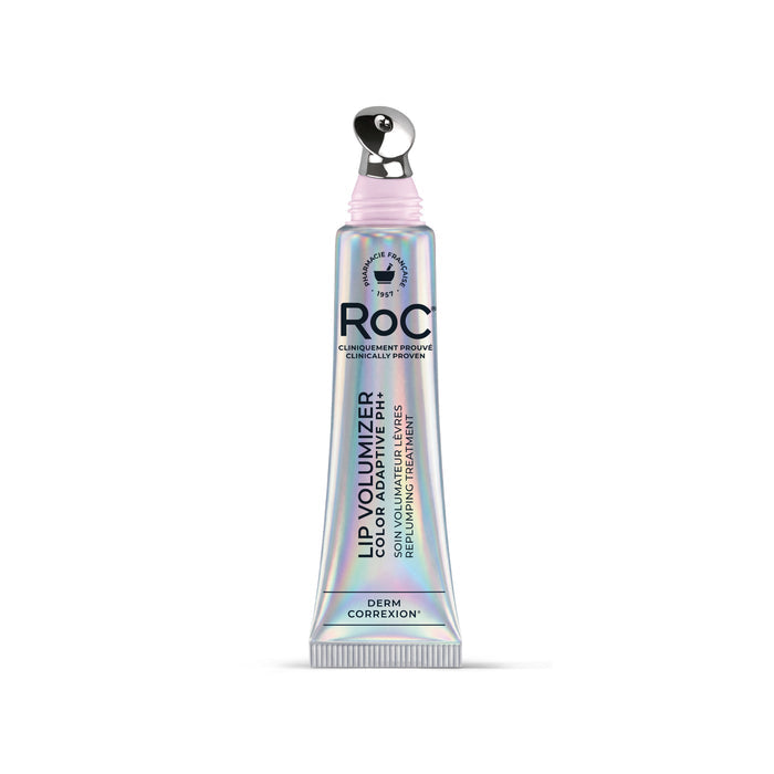 A squeeze tube of RoC Lip Volumizer in Derm Correction, featuring a holographic silver body, a light pink cap, and a silver roller applicator, set against a plain white background.