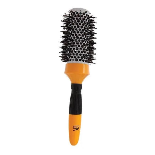 Extra Round Hair Brush standing upright, black bristles on a vented gray barrel with an orange handle marked GK