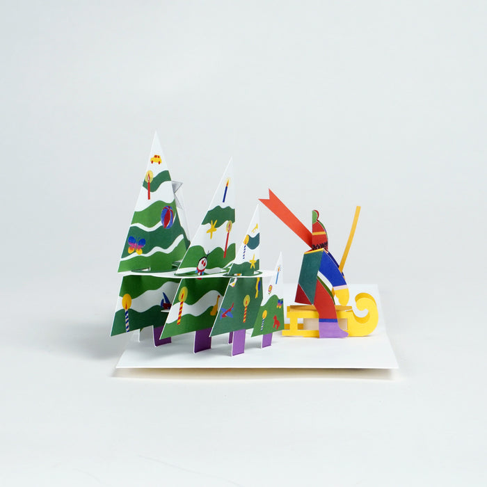 Colorful 3D paper Christmas tree and reindeer on a white background