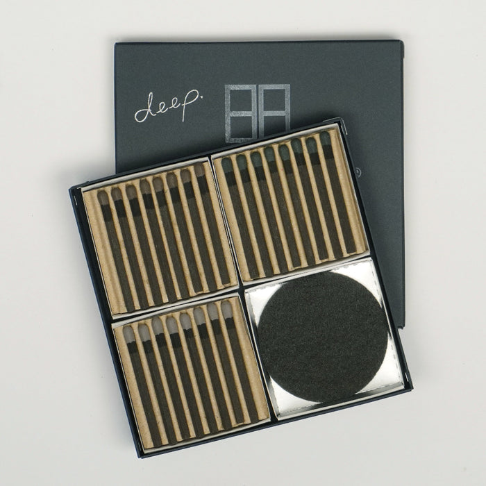 Hibi Deep incense matches gift set, opened to reveal match trays and a reusable felt burning mat, photographed on a white background.