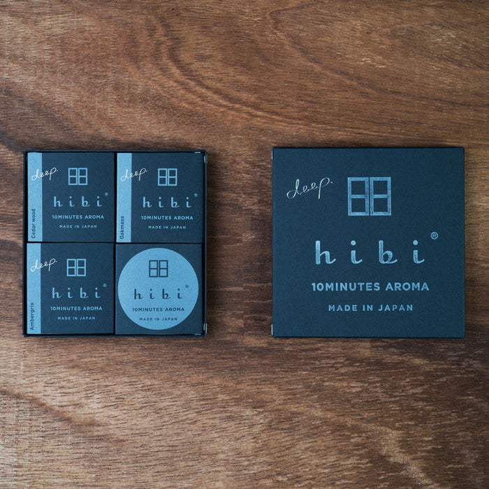 Hibi Deep incense matches gift box set on a wooden surface, showing three scent boxes and a black hibi presentation box labeled ‘10 Minutes Aroma, Made in Japan.