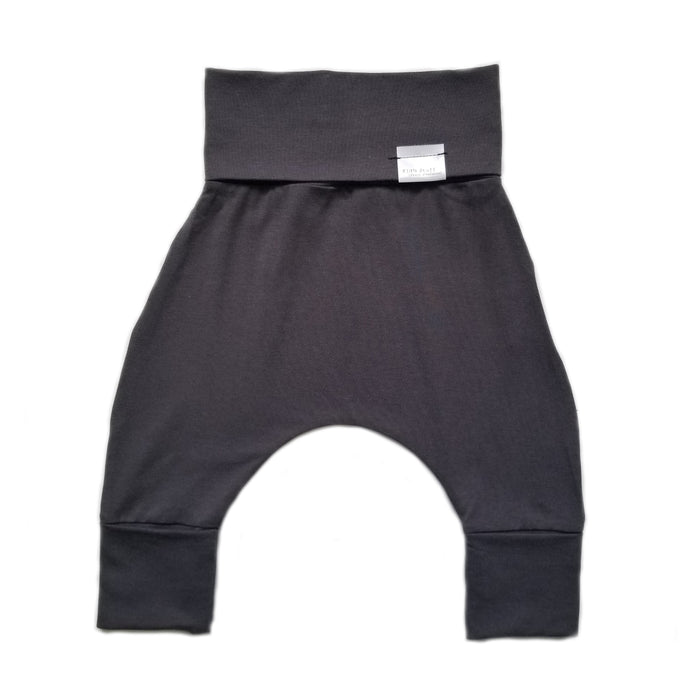Dark Grey grow-with-me pants for toddlers and kids, made from soft, eco-friendly fabric. Adjustable waistband and cuffs for extended wear. Ethically made in Canada.