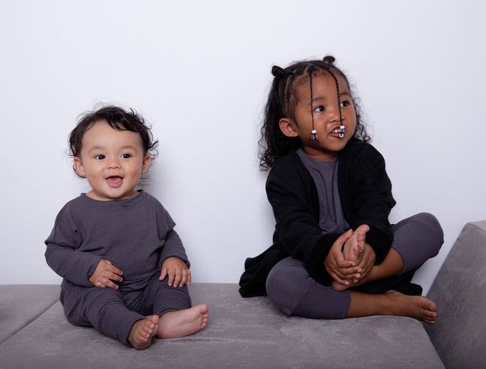 Dark Grey grow-with-me shirt for toddlers and kids, designed to be worn as a dress, tunic, or long shirt. Seamless shoulders and soft, eco-friendly fabric. Ethically made in Canada.