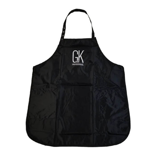 Front view of the black GK Hair Professional stylist apron with an adjustable snap neck strap and three pockets