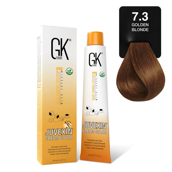 GK Hair Juvexin Cream Color Goldens 7.3 Golden Blonde carton and 100 ml tube beside a caramel golden brown swatch card