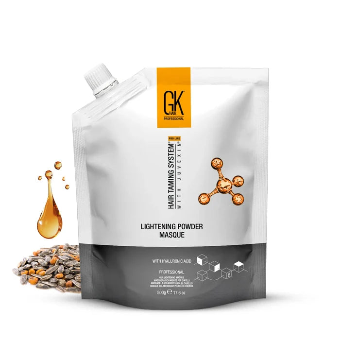 GK Hair Lightening Powder Masque with Hyaluronic Acid, 500 g white and gray stand-up pouch beside seeds and an amber oil drop