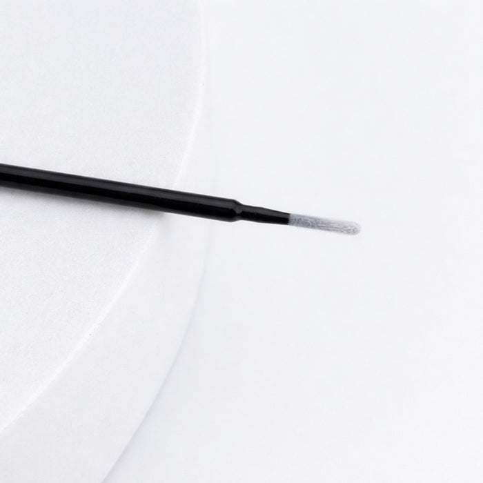 Long tip micro brush close up on white background