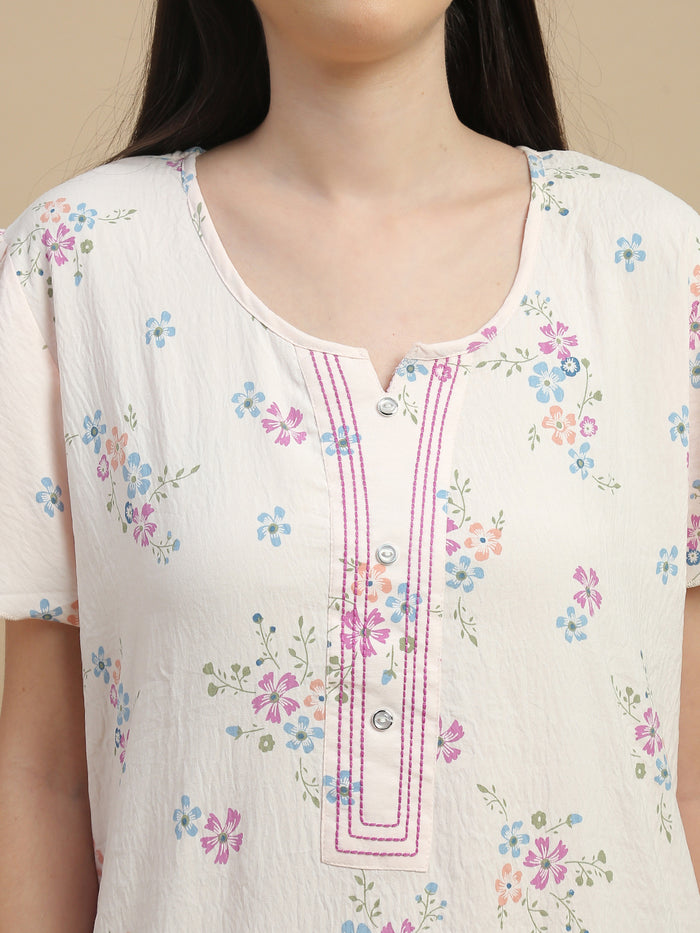Peach floral night gown for women with an elegant and lightweight design