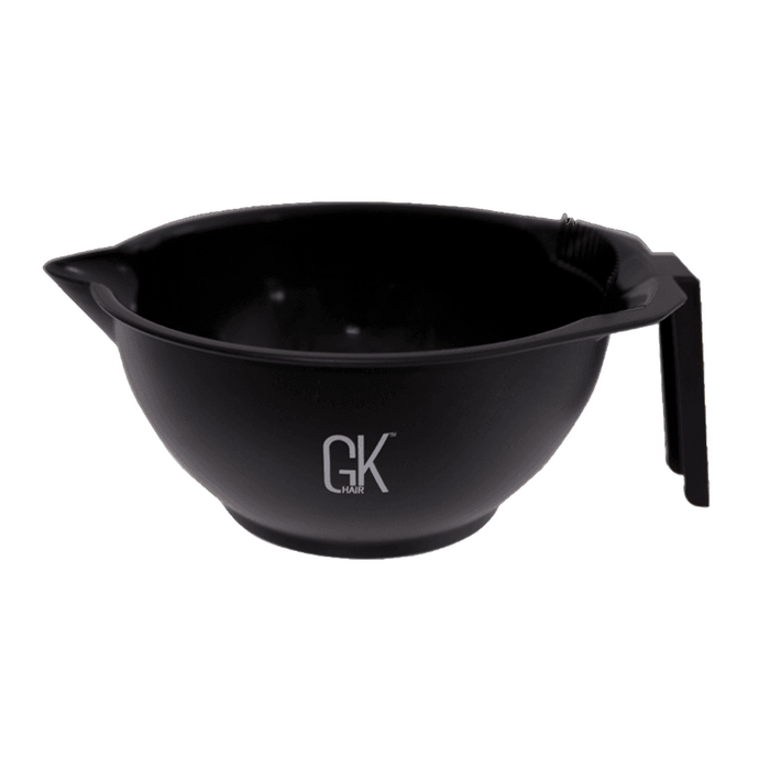 GK Hair black plastic tint mixing bowl with a pour spout and side handle, silver GK Hair logo on the front, on white