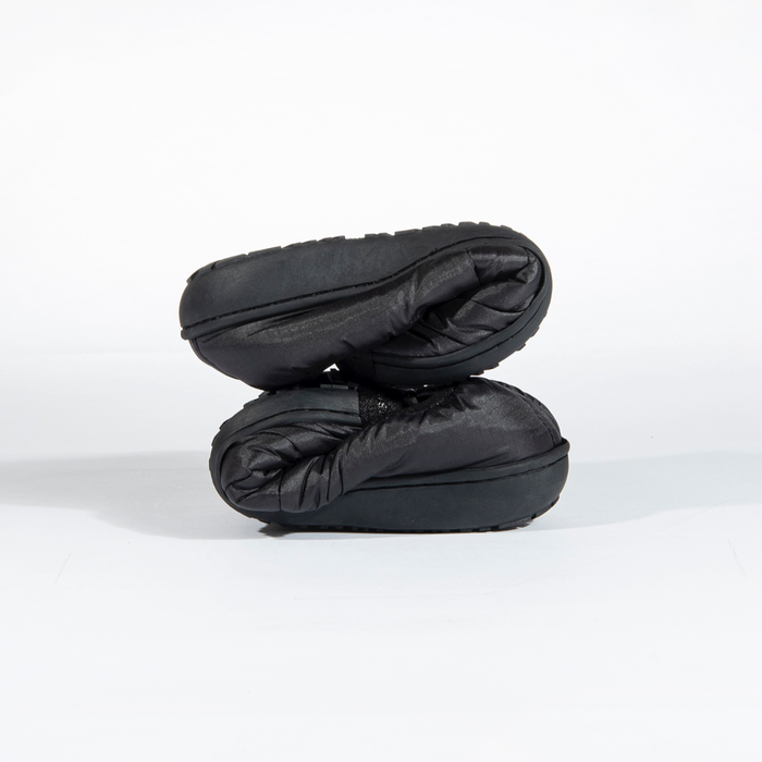 SUBU, a brand known for its stylish, insulated slip-on shoes, offering comfort and warmth with a sleek design, perfect for indoor and outdoor use during colder months.