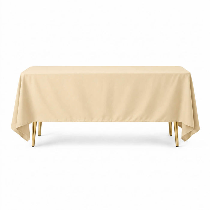 Beige wrinkle-resistant polyester tablecloth 72"x120" for reusable table cover.