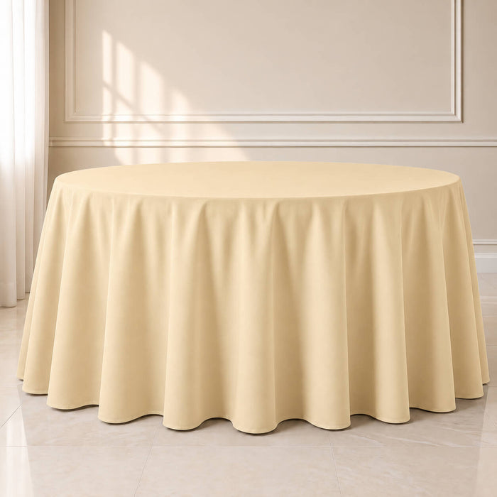 Beige polyester round tablecloth, 120 inches, durable seamless cover.
