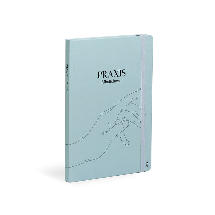 Karst Praxis Mindfulness guided journal with light blue hardcover and elastic band, mindfulness notebook designed for reflection, self-awareness, and daily mental wellness practice.