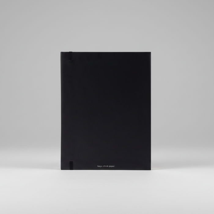 Black notebook on a light gray background