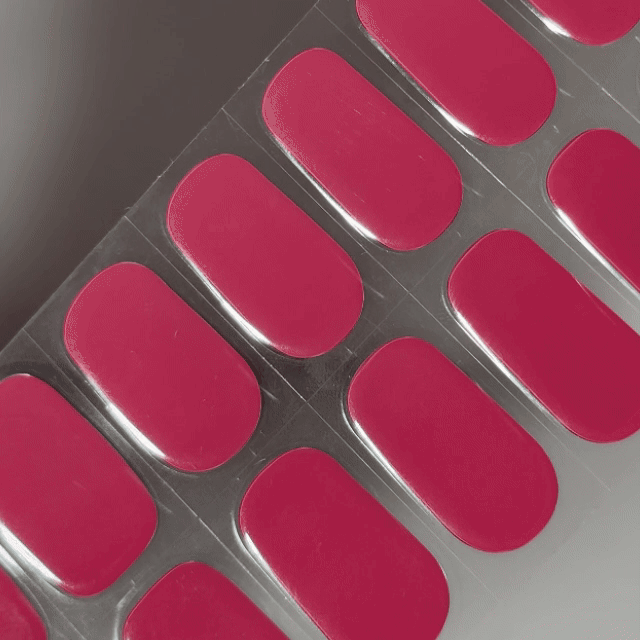 EyeCandys Raspberry Milk Gel nail sticker featuring a rich, creamy raspberry pink hue with a smooth, glossy finish. This semi-cured gel set delivers a vibrant, berry-toned manicure—perfect for playful, chic looks with effortless, long-lasting wear.