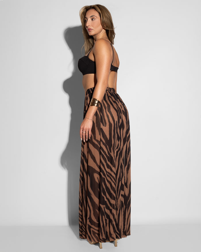 Model wearing Ringy Sheer Slit Skirty - Mocha Zebra back view