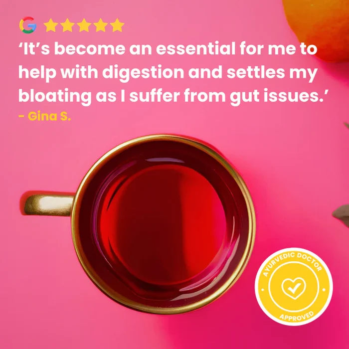 Red tea cup on a pink background with text and a logo.