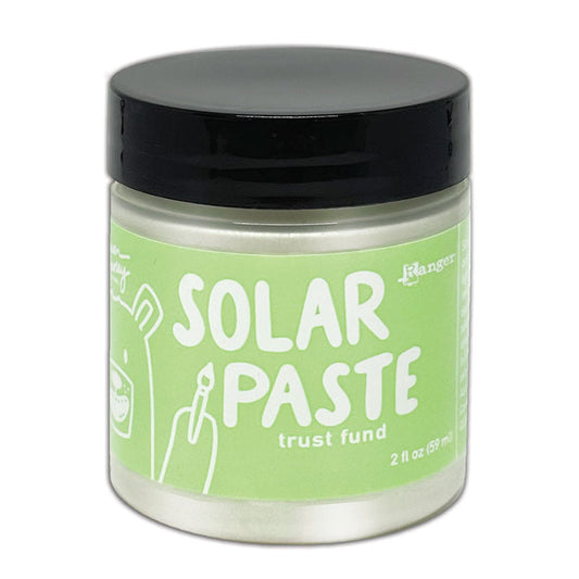 Simon Hurley  create. Solar Paste 2oz Trust Fund. A white paste with a metallic color shift. Available at Embellish Away located in Bowmanville Ontario Canada.