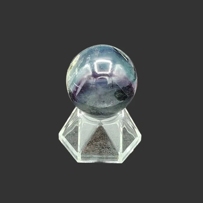 This is the left side view of this polished fluorite sphere