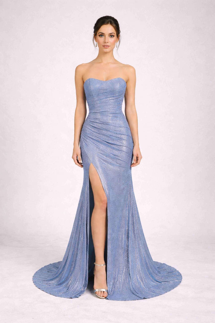 Luna Dusty Blue Strapless Glitter Dress by Jessica Stuart featuring a pleated bodice, high leg slit, and floor-length fitted silhouette.